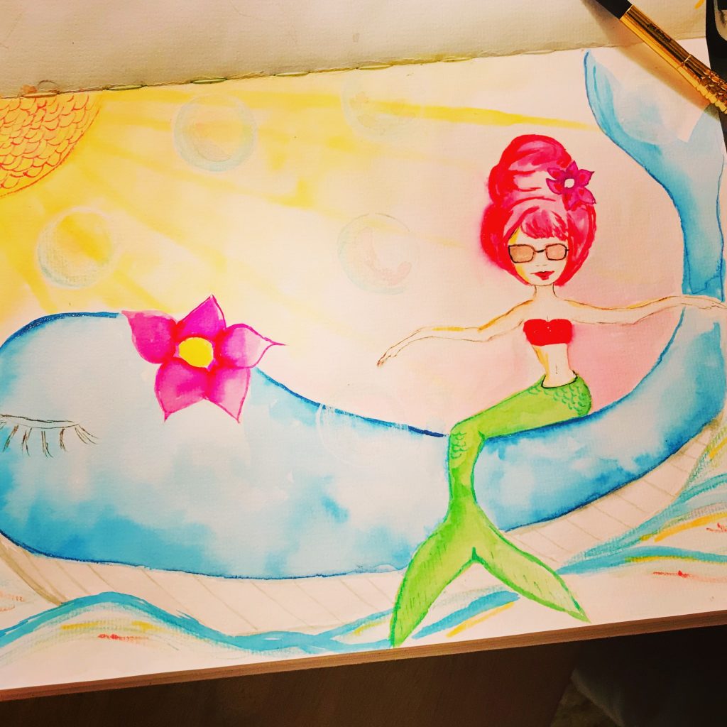 Mermaid riding whale