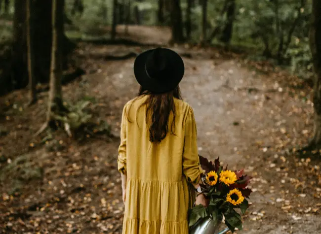 Girl with flowers in park